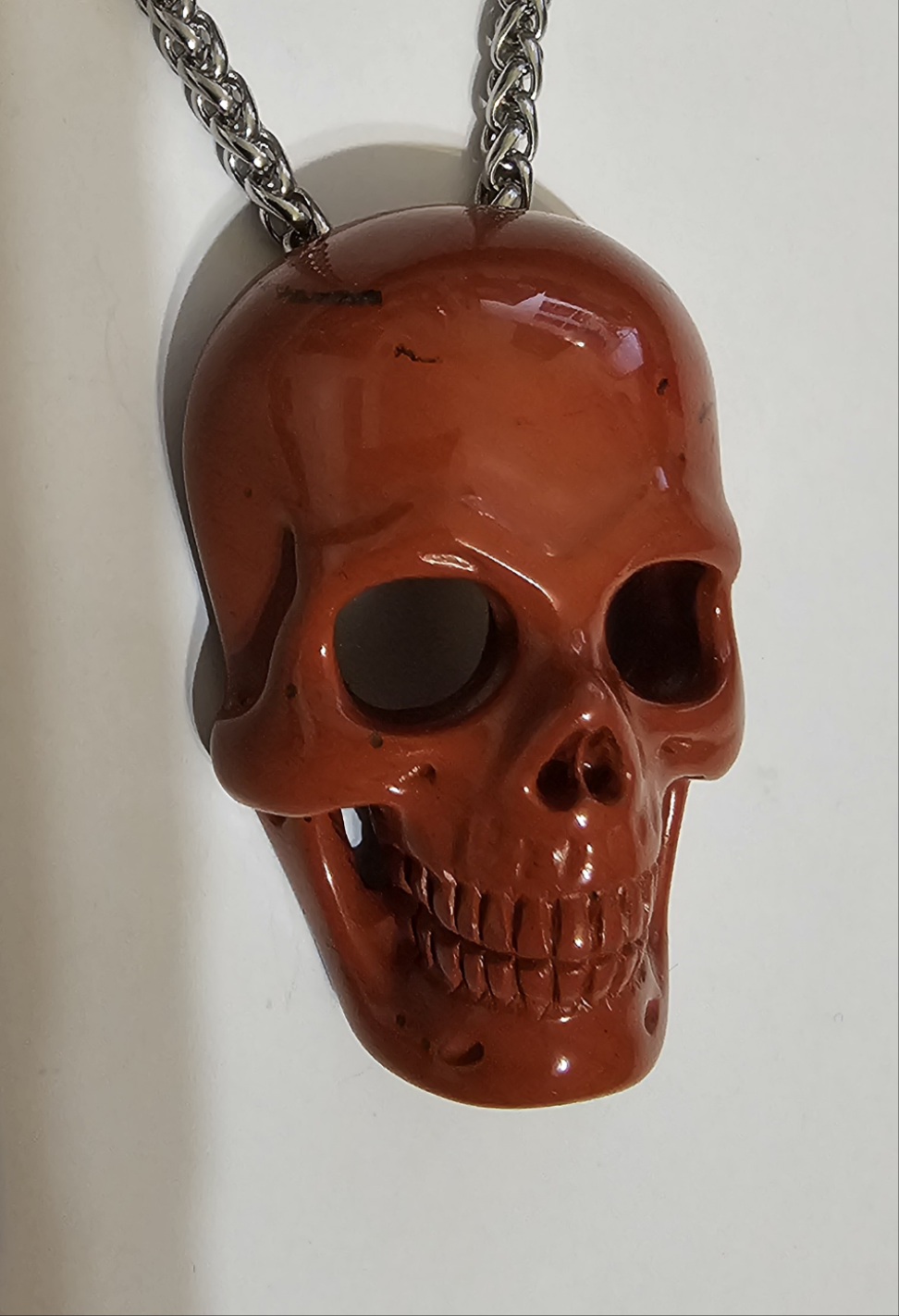 Red Jasper, Skullis, hand carved skull with invisible bale & stainless steel chain