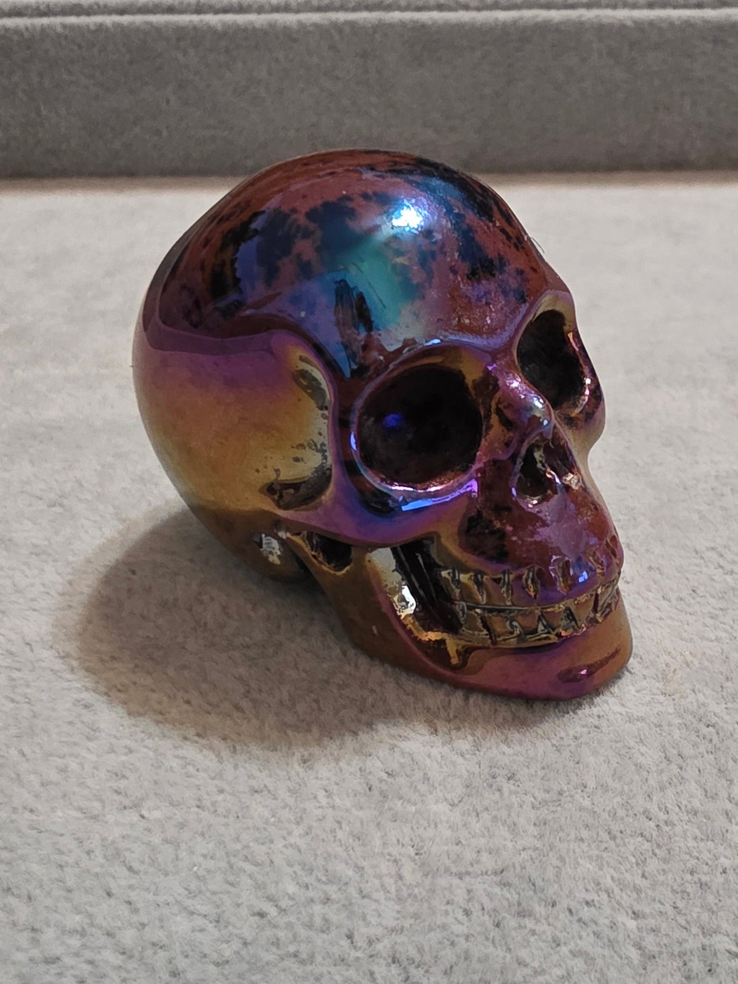 Aura coated Mahogany Obsidian 2" hand carved skull